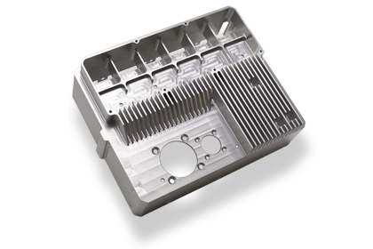 Machined metal component with circular features